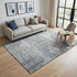 5' X 8' Taupe Blue And Gray Abstract Washable Area Rug With UV Protection