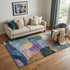 5' X 8' Blue Orange Pink And Purple Abstract Geometric Washable Area Rug With UV Protection