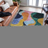 8' X 10' Green Orange Teal And Pink Abstract Washable Area Rug With UV Protection