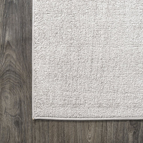 5' X 8' Cream Area Rug