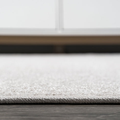 5' X 8' Cream Area Rug