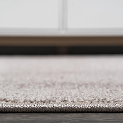 5' X 8' Beige Area Rug
