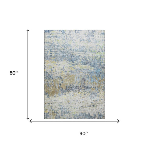 5' X 8' Blue Gold And Beige Abstract Washable Area Rug With UV Protection
