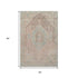 5' X 8' Pink Beige And Teal Tribal Washable Area Rug With UV Protection