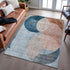8' X 10' Rust Teal And Beige Geometric Washable Area Rug With UV Protection