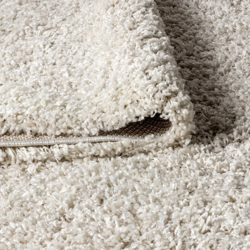 5' X 8' Cream Area Rug With Fringe