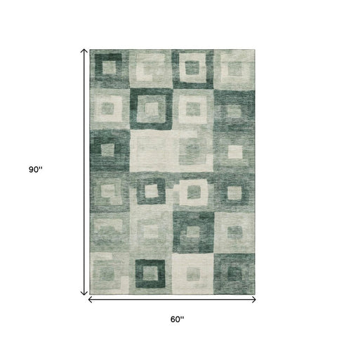 5' X 8' Green And Ivory Geometric Washable Area Rug With UV Protection