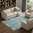 8' X 10' Teal Beige And Pink Floral Washable Area Rug With UV Protection