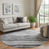 8' Charcoal And Ivory Striped Washable Round Rug With UV Protection
