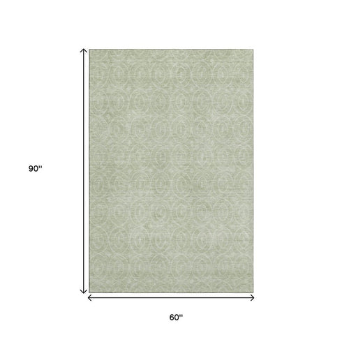 5' X 8' Mint Green And Ivory Geometric Washable Area Rug With UV Protection