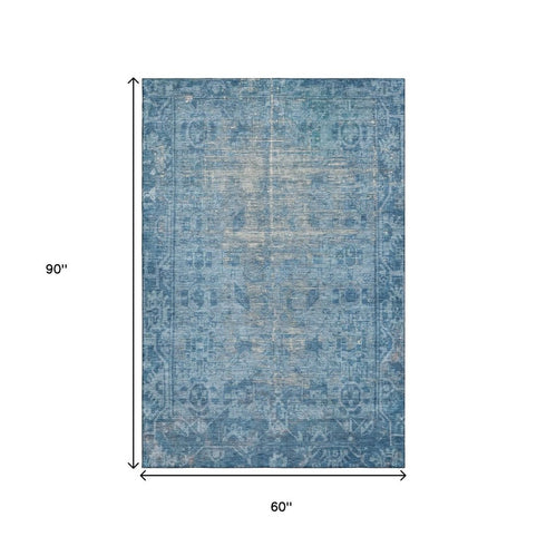 5' X 8' Blue And Silver Oriental Washable Area Rug With UV Protection