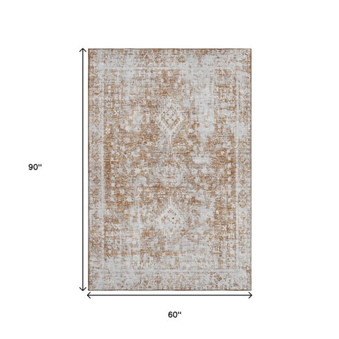 5' X 8' Terra Cotta And Silver Oriental Washable Area Rug With UV Protection
