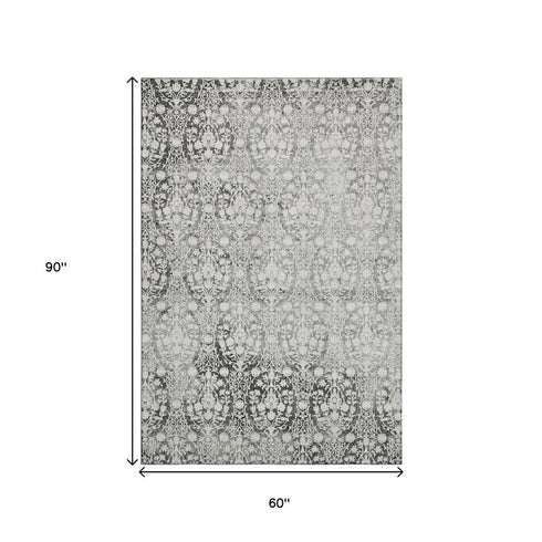 5' X 8' Charcoal And Ivory Damask Washable Area Rug With UV Protection