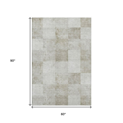 5' X 8' Beige Ivory And Taupe Geometric Washable Area Rug With UV Protection