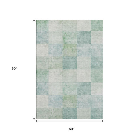 5' X 8' Pale Aqua Mint Green And Ivory Geometric Washable Area Rug With UV Protection