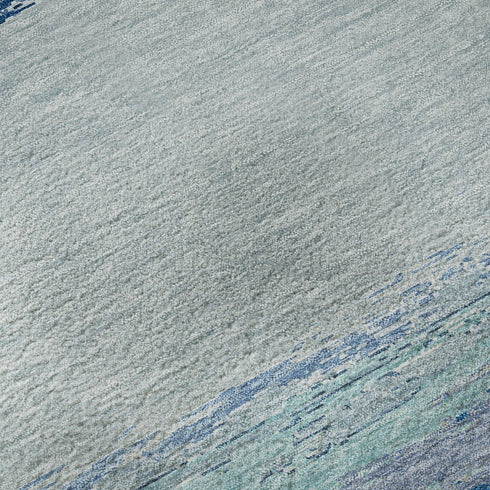 5' X 8' Blue And Ivory Abstract Washable Area Rug With UV Protection