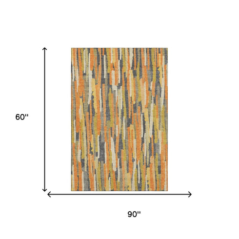5' X 8' Orange Gold And Ivory Striped Washable Area Rug With UV Protection