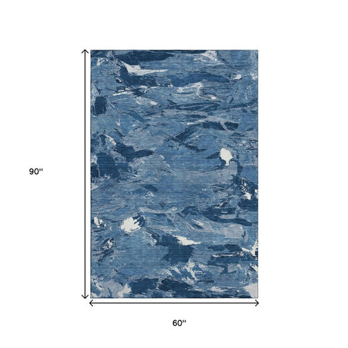 5' X 8' Navy Blue And Ivory Abstract Washable Area Rug With UV Protection