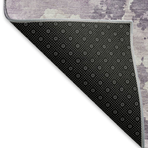 5' X 8' Lavender And Ivory Abstract Washable Area Rug With UV Protection