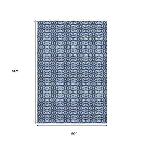 5' X 8' Blue And Ivory Geometric Washable Area Rug With UV Protection
