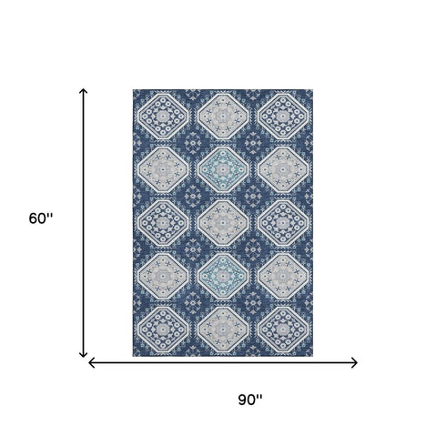 5' X 8' Navy Blue And Ivory Floral Washable Area Rug With UV Protection