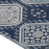 5' X 8' Navy Blue And Ivory Floral Washable Area Rug With UV Protection