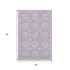 5' X 8' Lavender And Ivory Geometric Washable Area Rug With UV Protection