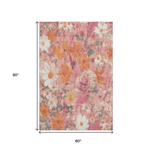 5' X 8' Blush Orange And Ivory Floral Washable Area Rug With UV Protection