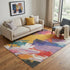 5' X 8' Gold Purple Teal And Red Abstract Washable Area Rug With UV Protection