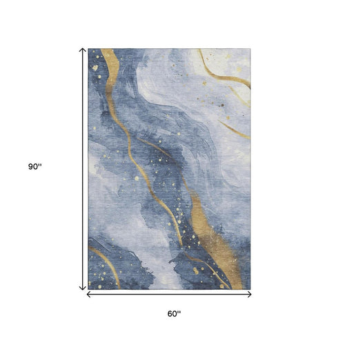 5' X 8' Blue Gold And Ivory Abstract Washable Area Rug With UV Protection
