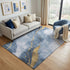 5' X 8' Blue Gold And Ivory Abstract Washable Area Rug With UV Protection