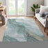 8' Teal Green And Ivory Abstract Washable Area Rug With UV Protection