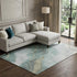 9' X 12' Teal Green And Ivory Abstract Washable Area Rug With UV Protection