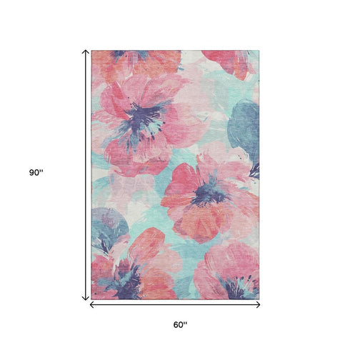 5' X 8' Pink Blue And Ivory Floral Washable Area Rug With UV Protection