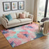 5' X 8' Pink Blue And Ivory Floral Washable Area Rug With UV Protection