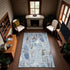 8' Sky Blue Taupe And Ivory Geometric Washable Area Rug With UV Protection