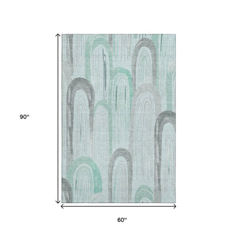 5' X 8' Pale Aqua Gray And Silver Geometric Washable Area Rug With UV Protection