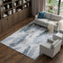 9' X 12' Sky Blue Gray And Ivory Abstract Washable Area Rug With UV Protection