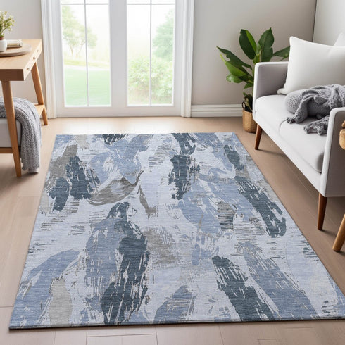 9' X 12' Sky Blue Gray And Ivory Abstract Washable Area Rug With UV Protection