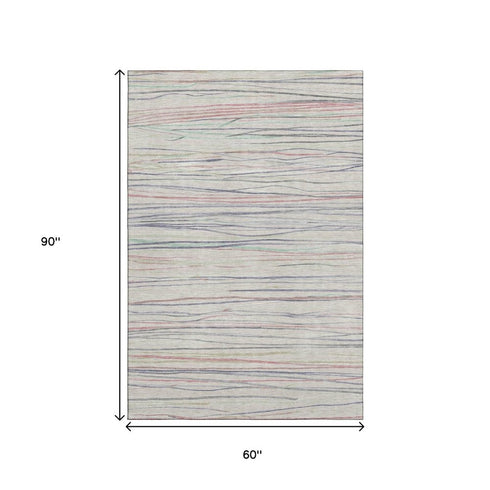 5' X 8' Beige Pink And Purple Striped Washable Area Rug With UV Protection
