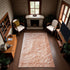 8' Coral And Ivory Abstract Washable Area Rug With UV Protection