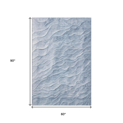5' X 8' Denim Blue And Ivory Abstract Washable Area Rug With UV Protection