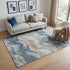 5' X 8' Blue Beige And Ivory Abstract Washable Area Rug With UV Protection