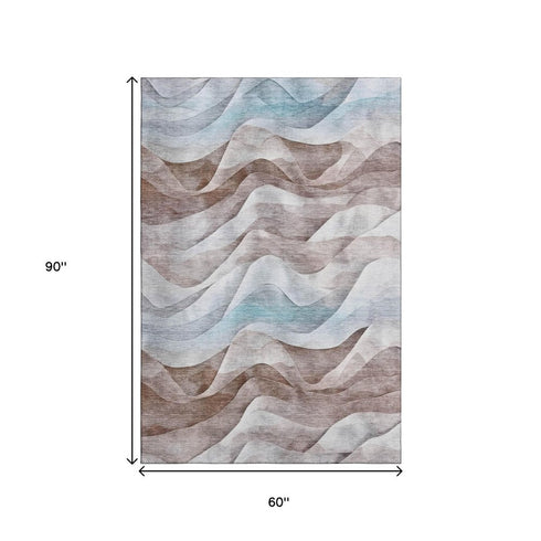 5' X 8' Coffee Blue And Ivory Abstract Washable Area Rug With UV Protection