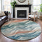 8' X 8' Teal Peach And Ivory Abstract Washable Round Rug With UV Protection