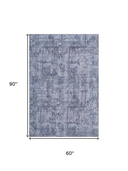 5' X 8' Blue And Ivory Abstract Washable Area Rug With UV Protection