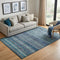 5' X 8' Blue Teal And Gray Striped Washable Area Rug With UV Protection