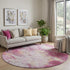 8' Pink Peach And Ivory Abstract Washable Round Rug With UV Protection