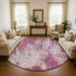 8' Pink Peach And Ivory Abstract Washable Round Rug With UV Protection