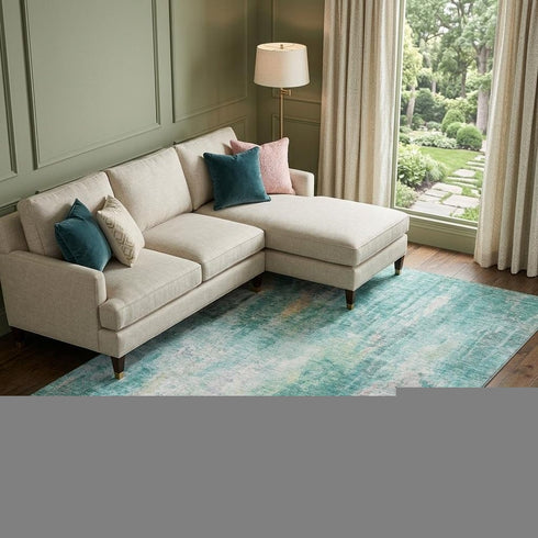 9' X 12' Teal Peach And Ivory Abstract Washable Area Rug With UV Protection